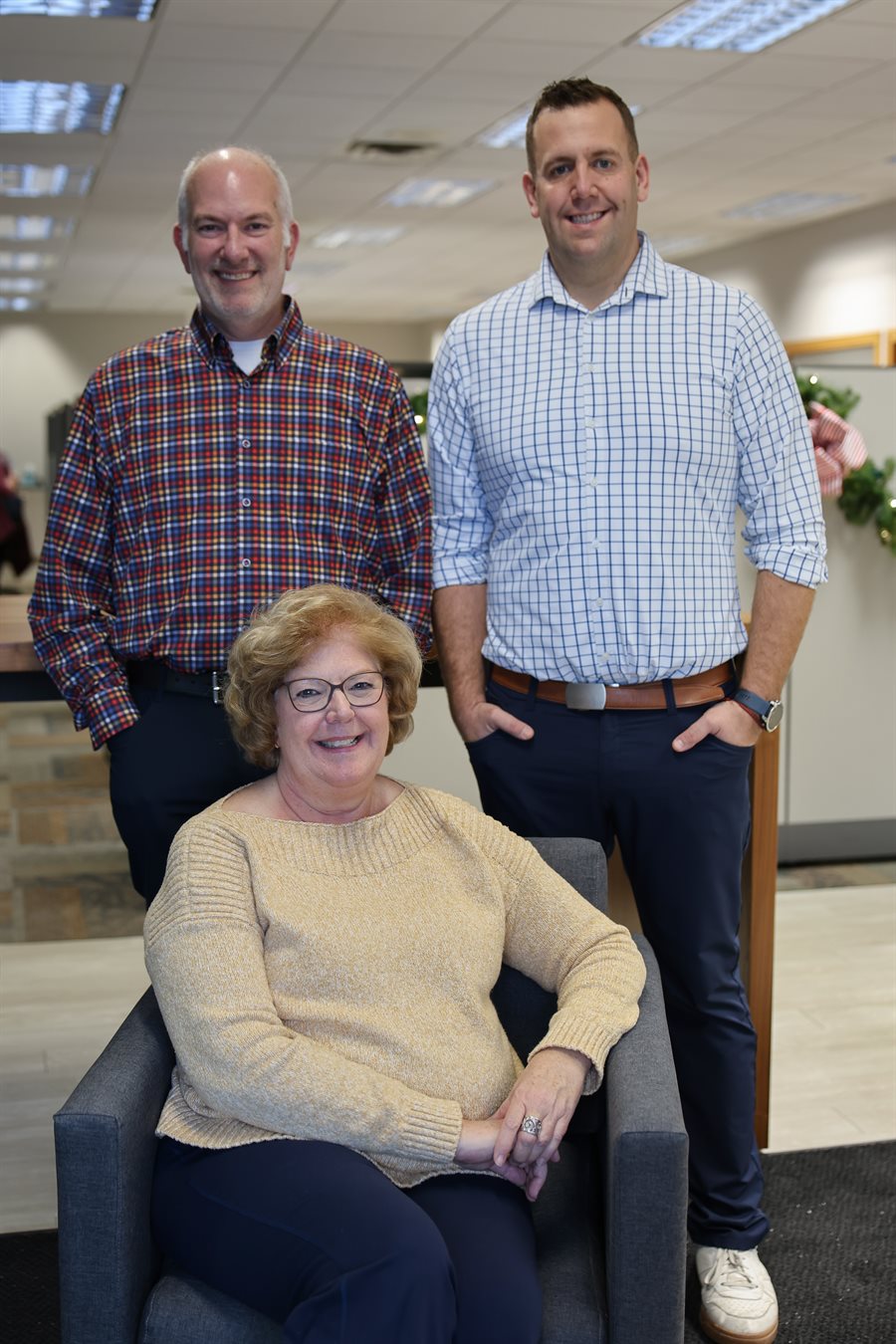 Jim Mangold, Laurie Weinhammer, and Stephen Quist of Mangold Insurance in Burlington, Wisconsin